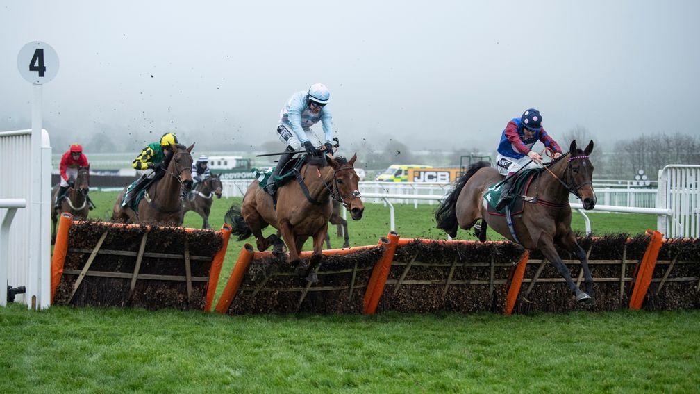 Paisley Park (right) pricks his ears as he clears the final flight in the Cleeve Hurdle