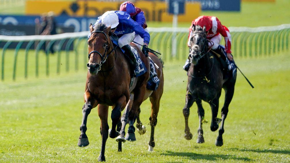NEWMARKET, ENGLAND - APRIL 30: James Doyle riding Coroebus (L, blue/white cap) win The Qipco 2000 Guineas Stakes at Newmarket Racecourse on April 30, 2022 in Newmarket, England. (Photo by Alan Crowhurst/Getty Images)