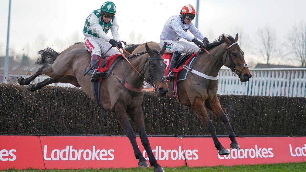 Richard Johnson riding Smarty Wild ( left) clear the last to win The Ladbrokes Where The Nation Plays Handicap Chase from Pistol Whipped at Kempton last time