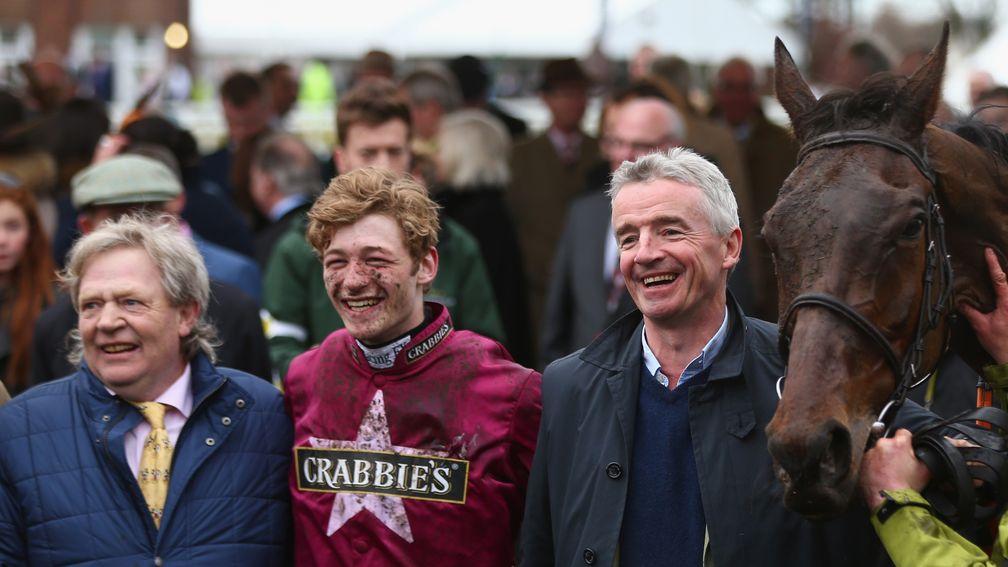 Michael O'Leary, Mouse Morris and jockey David Mullins after Rule The World's 2016 Grand National victory