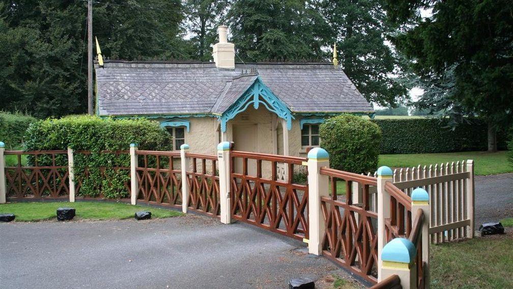 The gateposts and lodge are painted to match the discreet racing livery