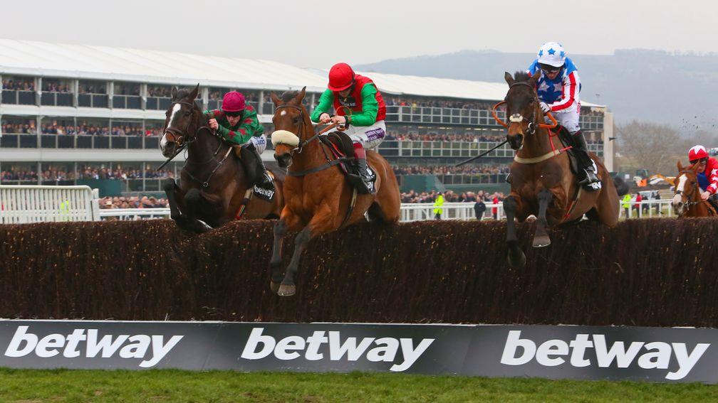 Dodging Bullets (centre) was an important horse for Twiston-Davies and Nicholls when the pair began their relationship