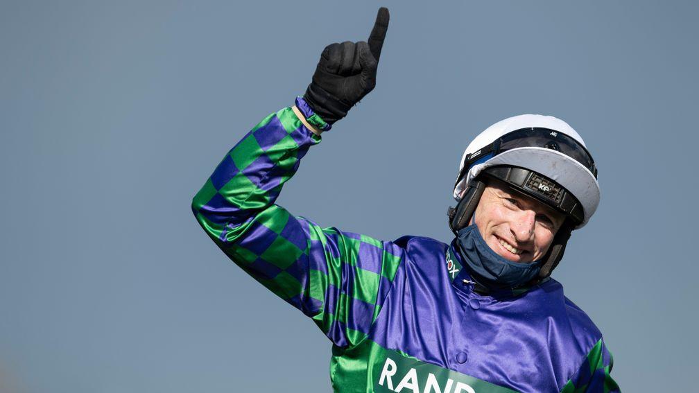 Tom O'Brien celebrates after Thyme Hill's win in the Liverpool Hurdle