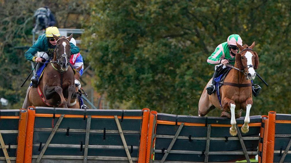 Alex Thorne and Twin Star (right) lead over the last at Taunton
