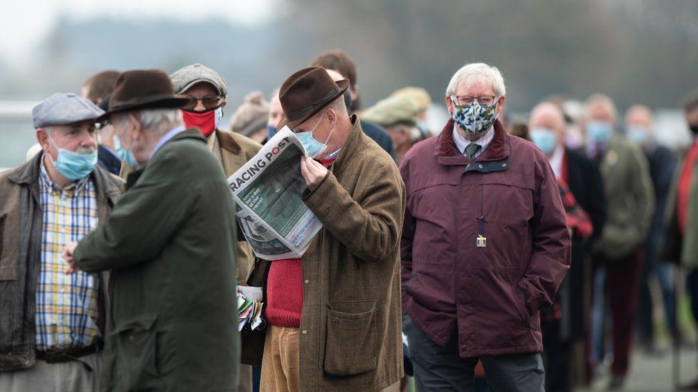 Race fans queue to enter the racecourse on the first day spectators are allowed back to watch the actionLudlow 2.12.20 Pic: Edward Whitaker/Racing Post
