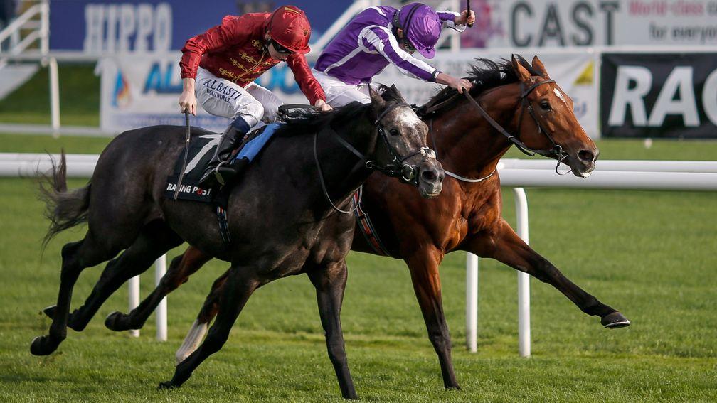Saxon Warrior and Ryan Moore (far side) battle Roaring Lion and Oisin Murphy at Doncaster