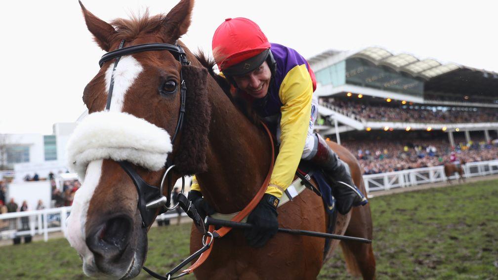 Richard Johnson hugs Native River after winning the Timico Cheltenham Gold Cup