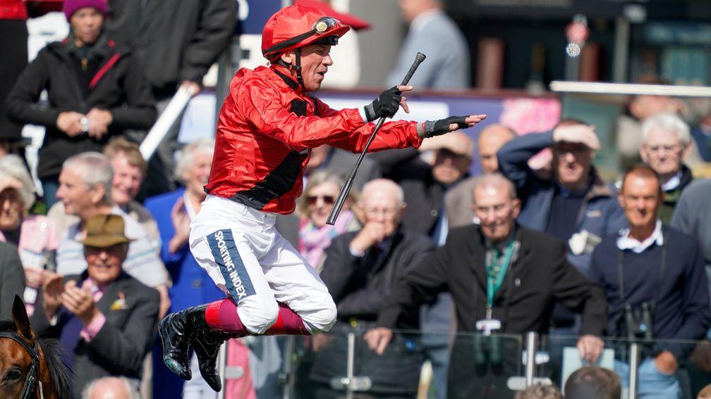 YORK, ENGLAND - MAY 11: Frankie Dettori leaps from Emily Upjohn in the winners enclosure after victory in The Tattersalls Musidora Stakes at York Racecourse on May 11, 2022 in York, England. (Photo by Alan Crowhurst/Getty Images)