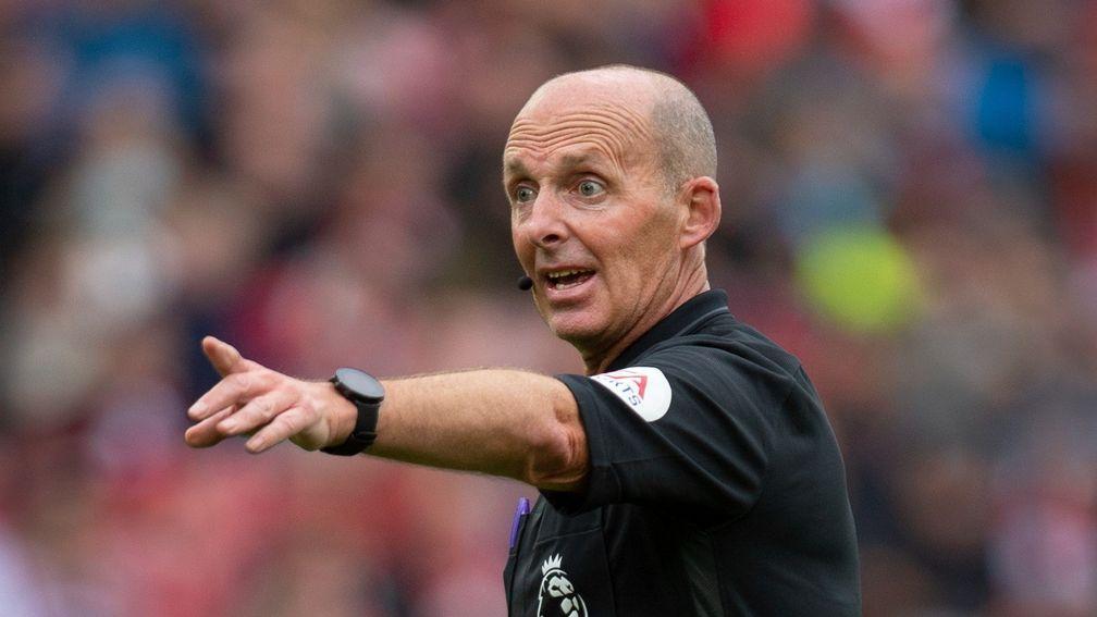 Mike Dean takes charge of Everton's clash with Arsenal