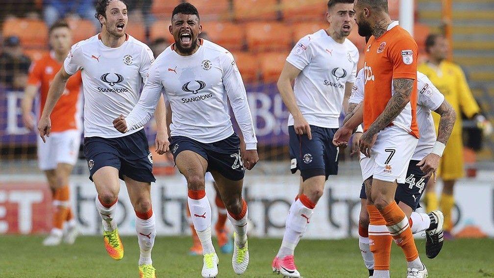 Isaac Vassell celebrates scoring for Luton against Blackpool in May