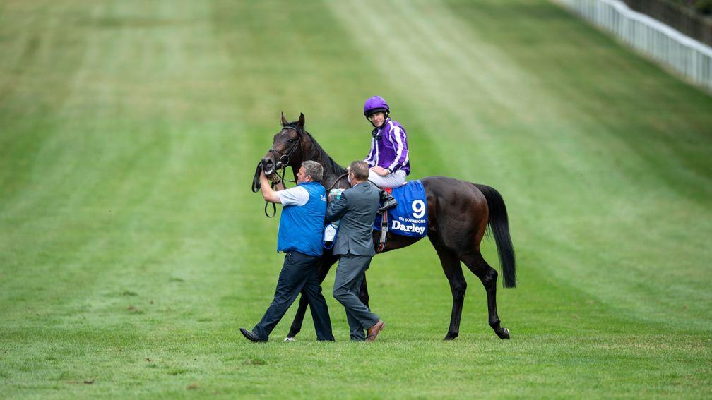 Ten Sovereigns and Ryan Moore after the Darley July Cup