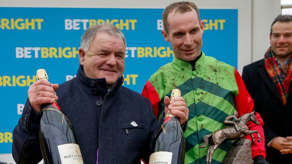 Brian Ellison and Danny Cook enjoy the spoils of victory after the Cotswold Chase