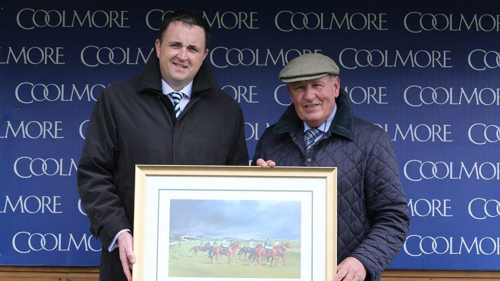Gerry Aherne (left): the breeder of Romanised on trophy presenting duty for Coolmore