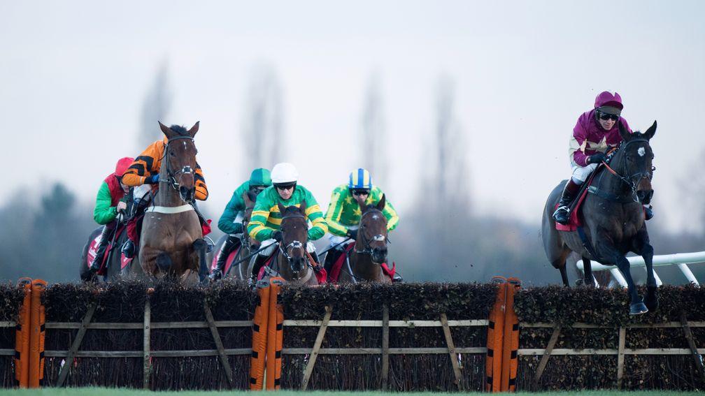 Beer Goggles (Richard Johnson, right) is not for catching in the Long Distance Hurdle