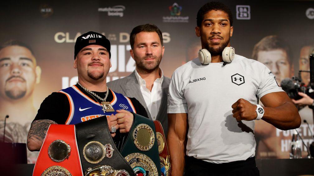 Andy Ruiz Jr and Anthony Joshua pose with the belts