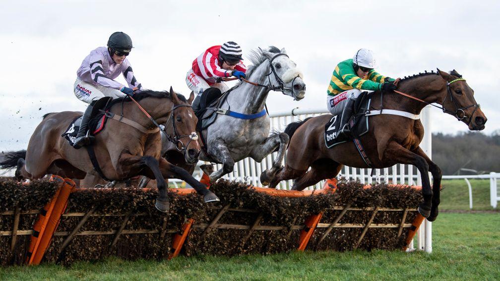 Champ (Barry Geraghty,right) jumps the final flight and beats Kateson (centre) and Getaway Trump in the Challow HurdleNewbury 29.12.18 Pic: Edward Whitaker