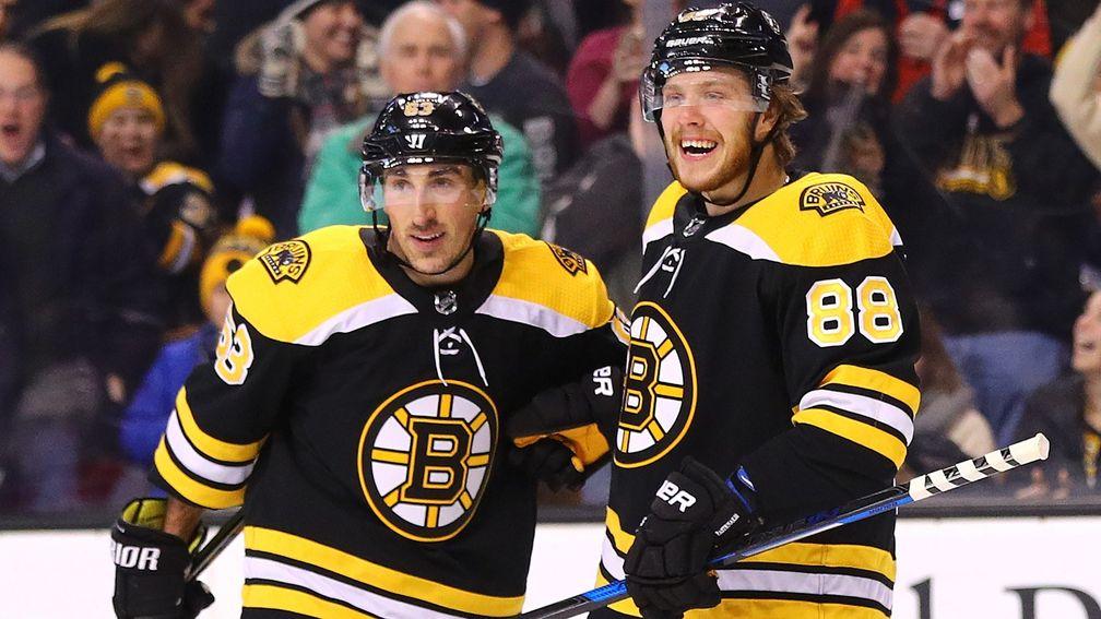 Boston's Brad Marchand (left) and David Pastrnak have scored nine goals each in the playoffs