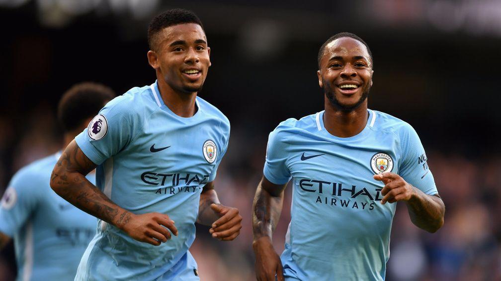 Raheem Sterling (right) and Gabriel Jesus enjoyed the 7-2 rout of Stoke