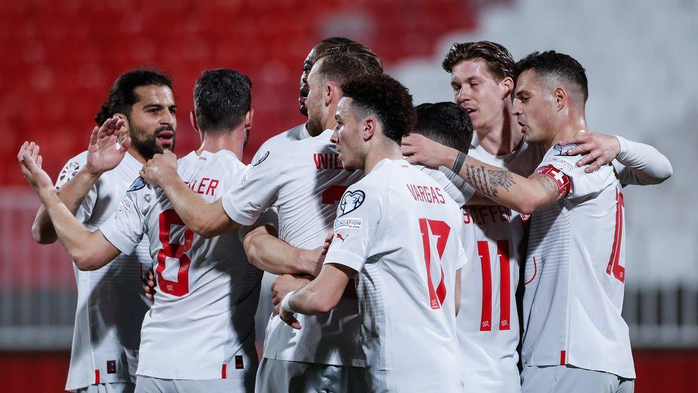 Switzerland celebrate one of Renato Steffen's three goals against Belarus