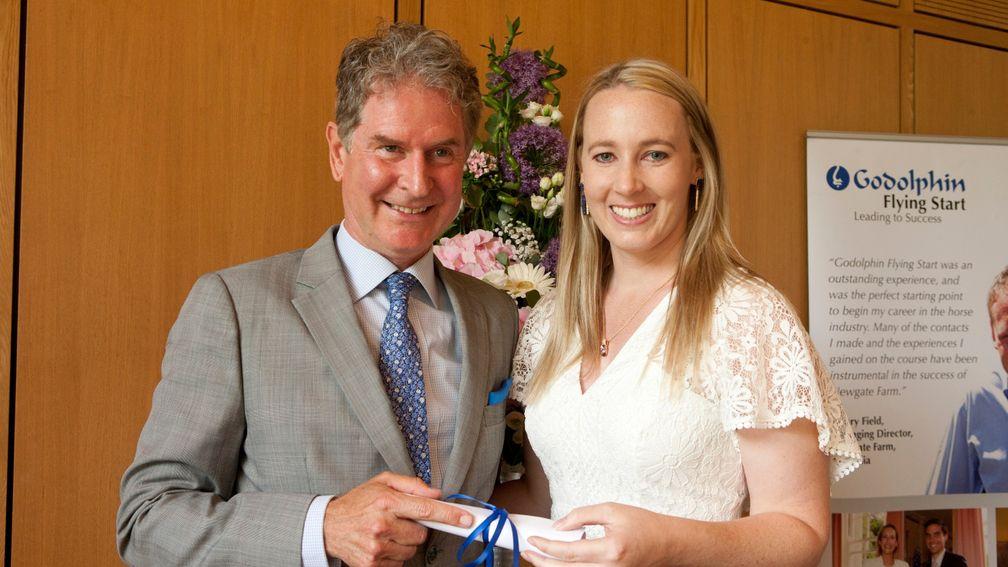 Katelyn Butler receives her diploma from Godolphin's Hugh Anderson