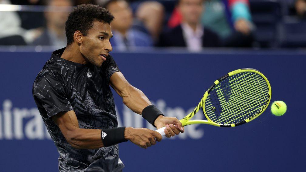 Felix Auger-Aliassime had to dig deep for a five-set victory over Roberto Bautista Agut in round three