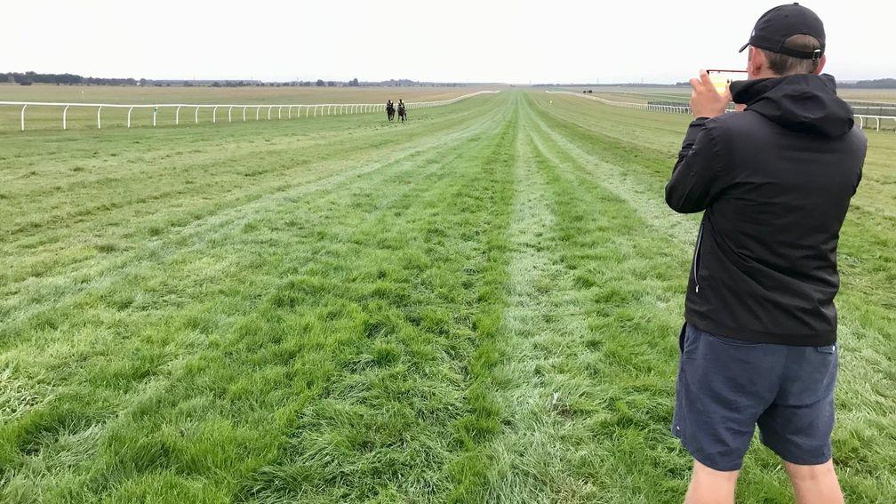 George Boughey watches work on the watered gallop