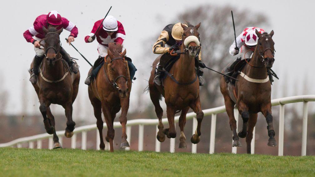 Tidal Bay and Ruby Walsh (second right) narrowly win a four-way finish with First Lieutenant, Sir Des Champs and Flemenstar in the 2012 Lexus Chase