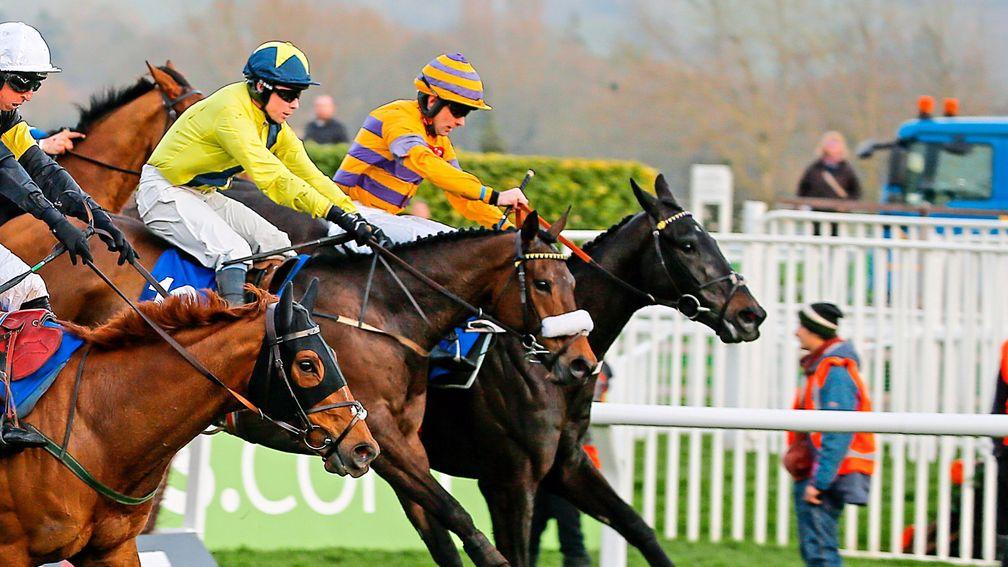 Tully East (yellow) heads for victory in Cheltenham's novice handicap chase in March
