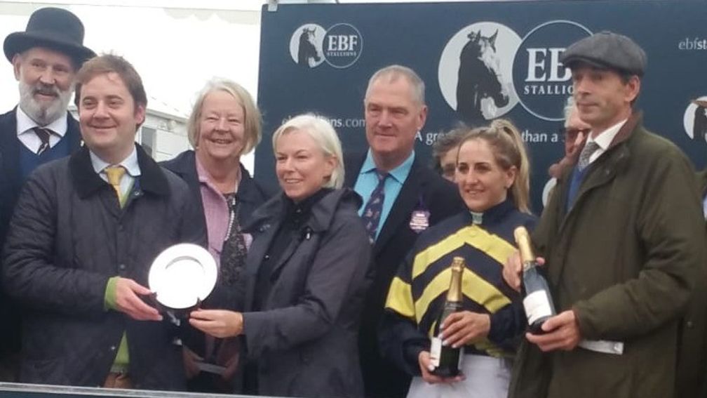 Dick Fellows-Smith (centre, blue shirt) with members of the Old Stoics Racing Club, trainer Jonny Portman (right) and jockey Josephine Gordon after Mild Illusion's victory in the Bosra Sham Stakes at Newmarket