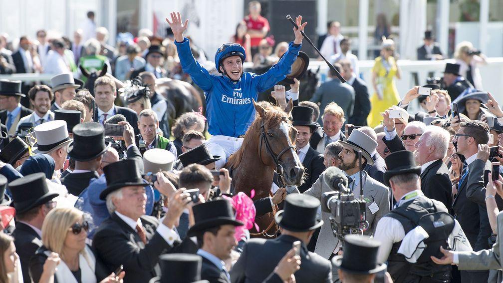 We are the champions: William Buick takes the ovation from the crowd as he and Masar are led back into the hallowed winner’s enclosure
