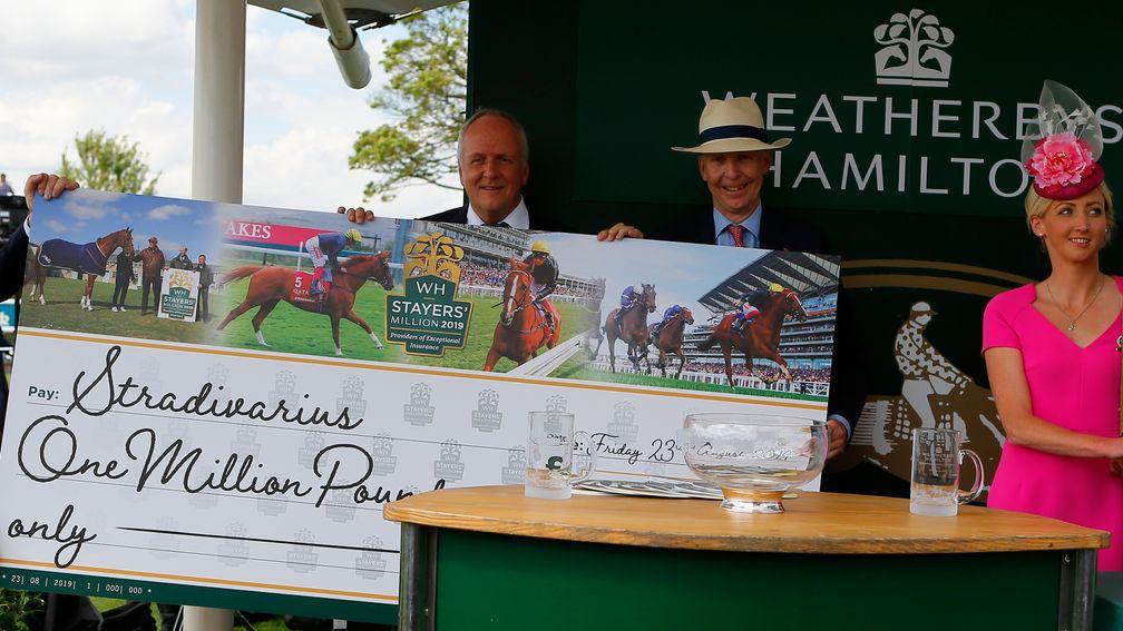Owner-breeder Bjorn Nielsen receives his second Weatherbys Stayers Million cheque following the Lonsdale victory of Stradivarius