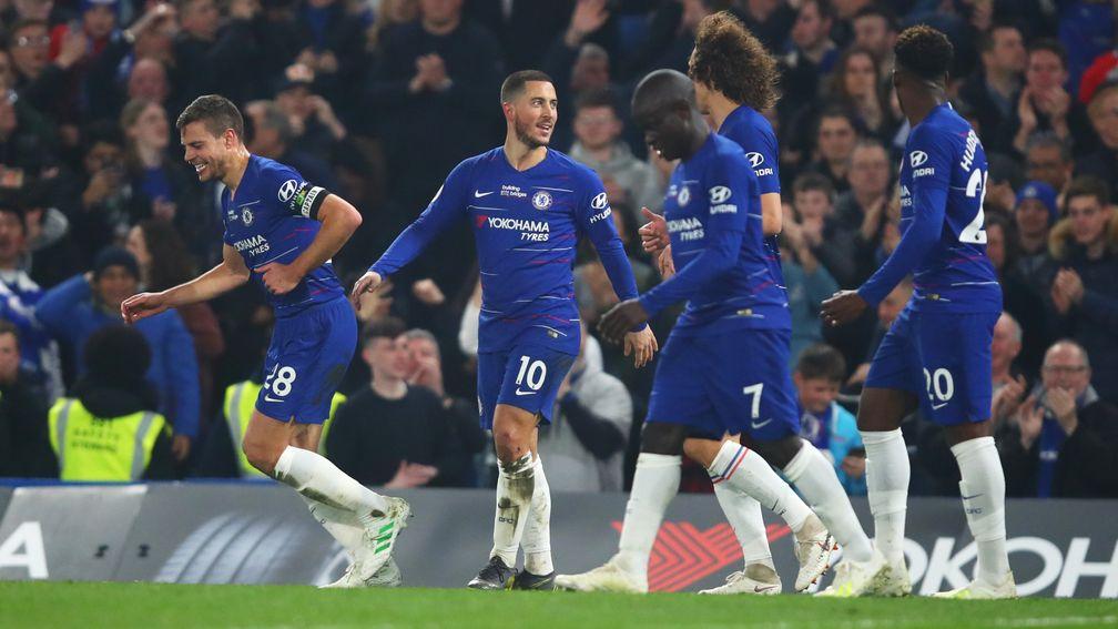 Eden Hazard celebrates his superb opener against West Ham with Chelsea colleagues
