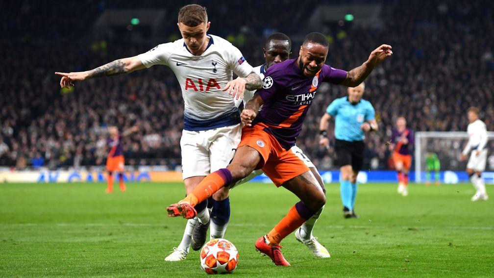 Kieran Trippier of Tottenham battles for possession with Raheem Sterling of Manchester City