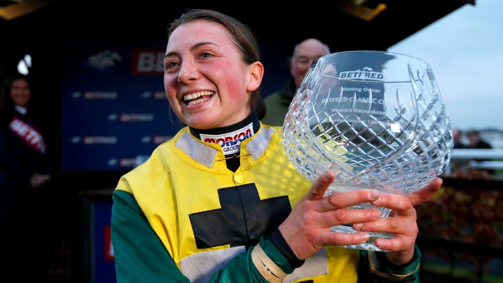 Bryony Frost celebrates winning the Betfred Classic Chase at Warwick on Milansbar