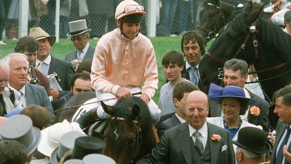 Steve Cauthen and Slip Anchor are led in by Lord Howard de Walden after winning the 1985 Derby