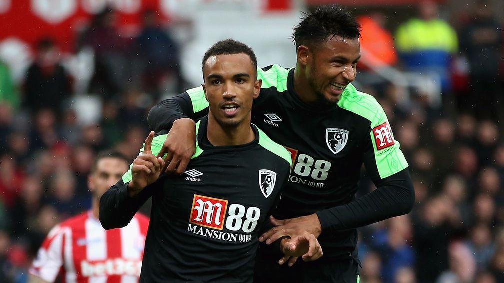 Junior Stanislas (left) earned Bournemouth a 2-1 win at Stoke