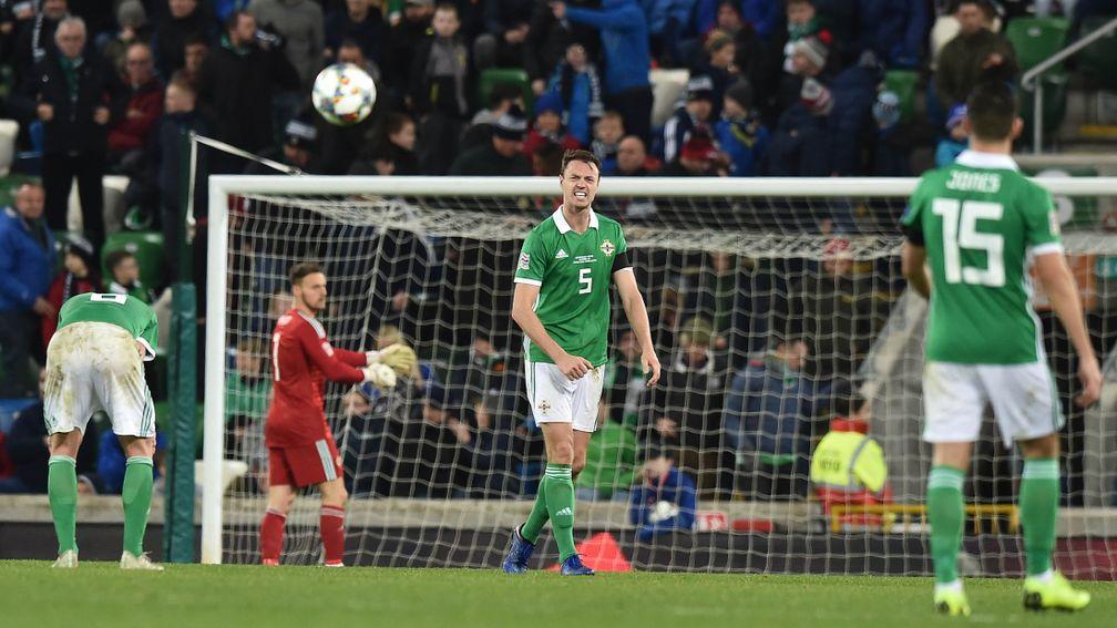 Jonny Evans of Northern Ireland screams in anguish after his side conceded a late against Austria