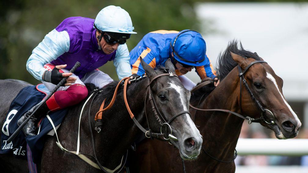 Royal Lytham (right) gets up past third-place Visinari in the July Stakes at Newmarket