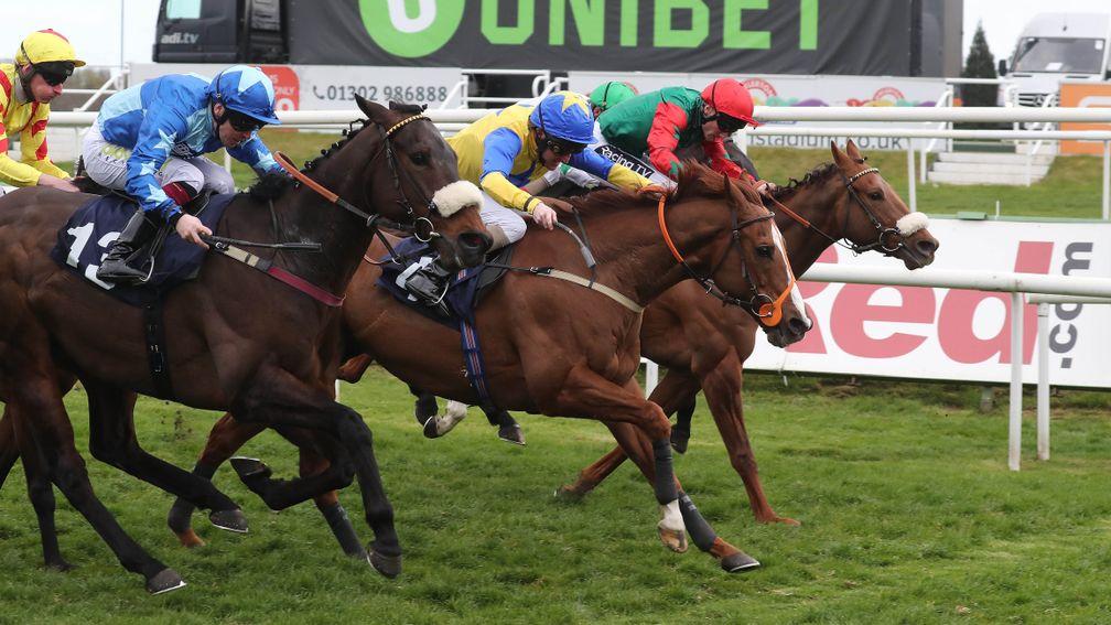 Foolaad (centre) came out on top in a photo-finish at Doncaster last time
