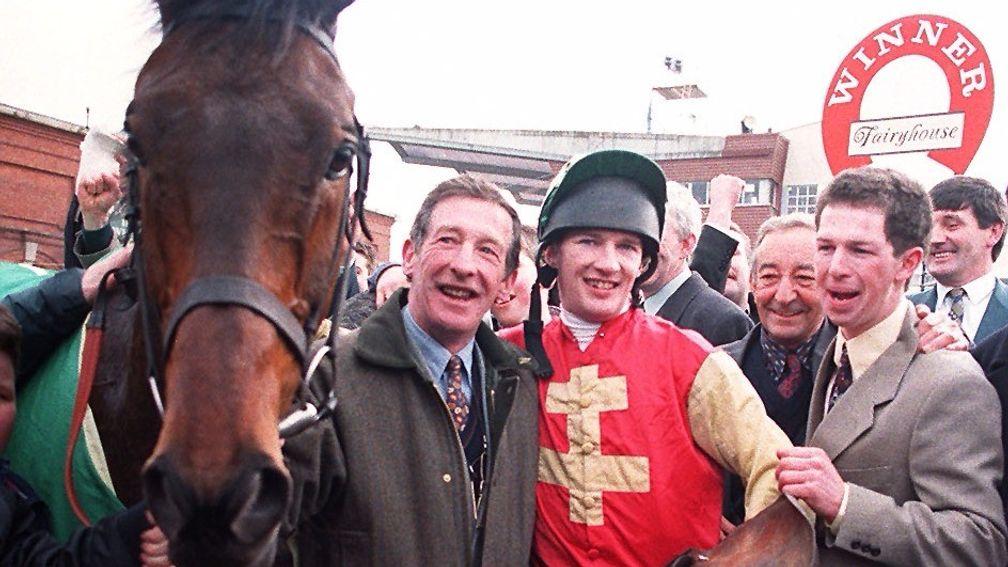 Tommy Carberry with son Paul after Bobbyjo's Irish Grand National success in 1998
