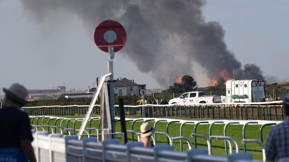 A blaze close to Yarmouth racecourse caused a delay to racing