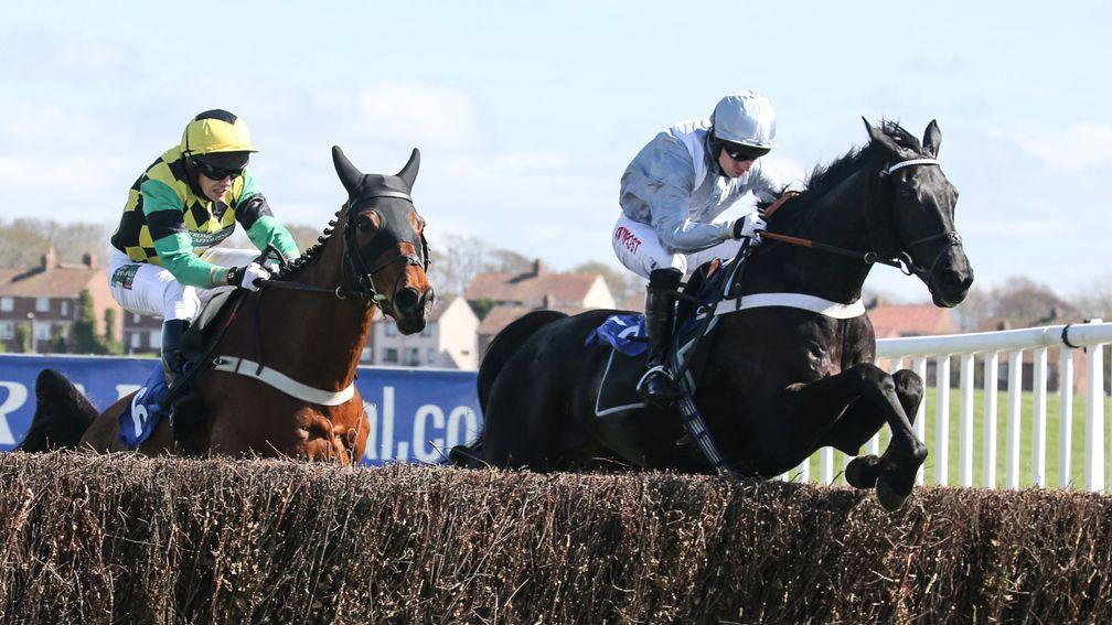 Vanituex (right) lands the Scotty Brand handicap chase during the Scottish Grand National at Ayr