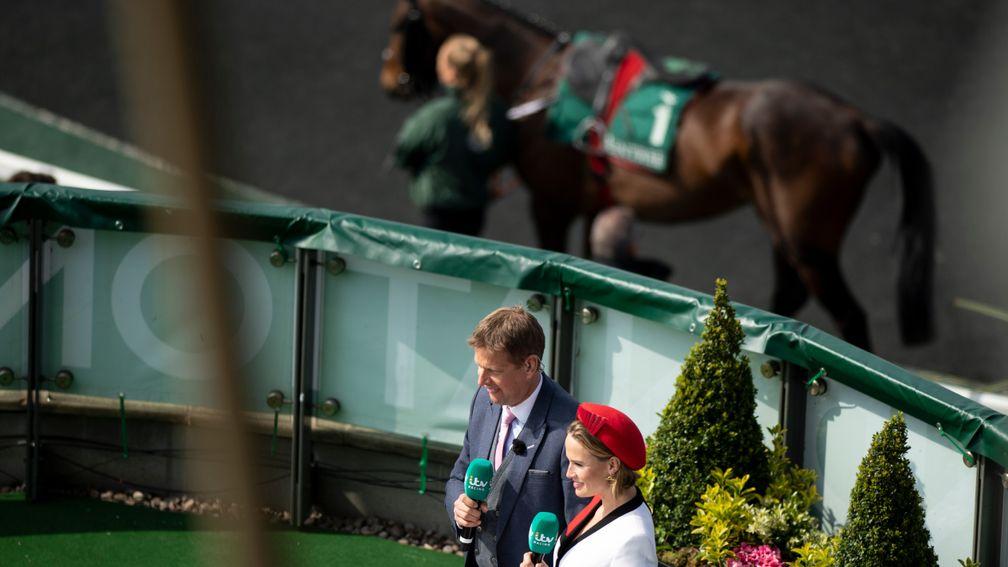 Ed Chamberlin and Francesca Cumani in action at Aintree
