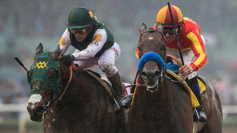 McKinzie and Mike Smith (right) battle with Bolt D'Oro at Santa Anita last month