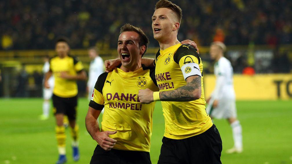 Marco Reus of Borussia Dortmund (right) celebrates with Mario Gotze