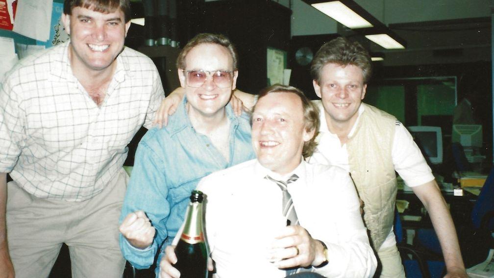 Brian Giles (holding champagne bottle) celebrates a winning day with Daily Mail colleagues Nick Townsend, Nigel Taylor and Max Moorcroft