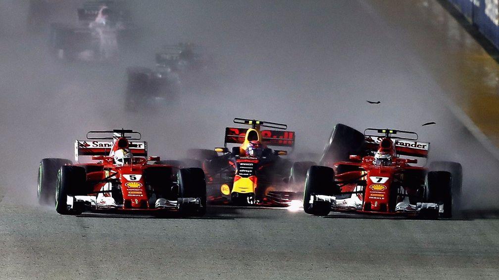 Carnage at the start as Sebastian Vettel (right) squeezes Max Verstappen into Kimi Raikkonen