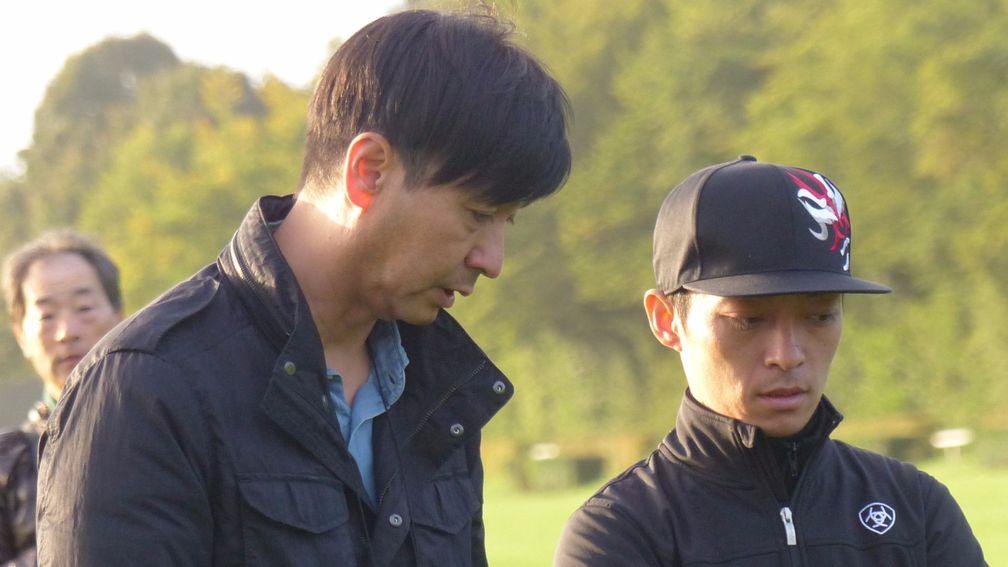 Trainer Yasutoshi Ikee talks to jockey Yuga Kawada, who will ride Satono Noblesse in Sunday's Prix Foy