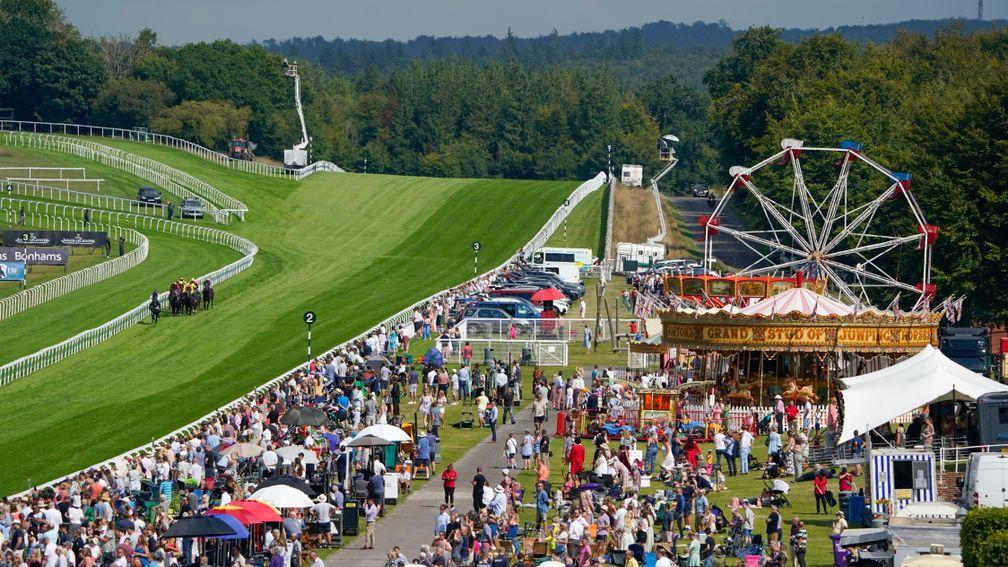 CHICHESTER, ENGLAND - AUGUST 27: A general view as runners in The William Hill Handicap pass the Lennox Enclosure at Goodwood Racecourse on August 27, 2022 in Chichester, England. (Photo by Alan Crowhurst/Getty Images)