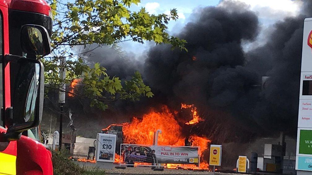 Firefighters battle the blaze near Fontwell racecourse